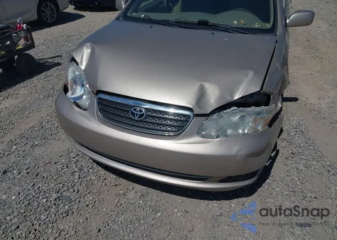 2005 Toyota Corolla Le z USA, uszkodzony, nr VIN 2T1BR32E35C465443